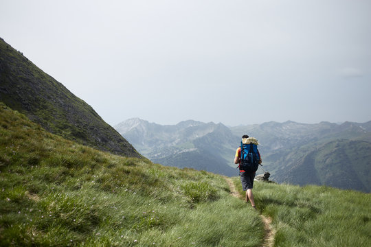 Young backpacker in a high trail of the Pyrenees