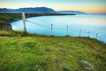 Picturesque morning bay with the traditional nature of Iceland.