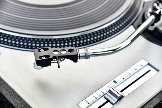 Detail of an old player and vinyl phonograph record