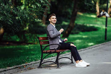 Man sitting on the park background