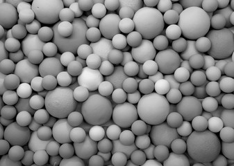 Black white background of balls of different sizes. Creative design.