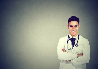 Smiling doctor posing with arms crossed