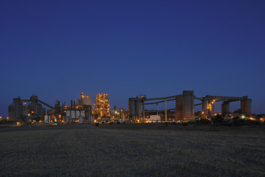 Cement factory at dusk