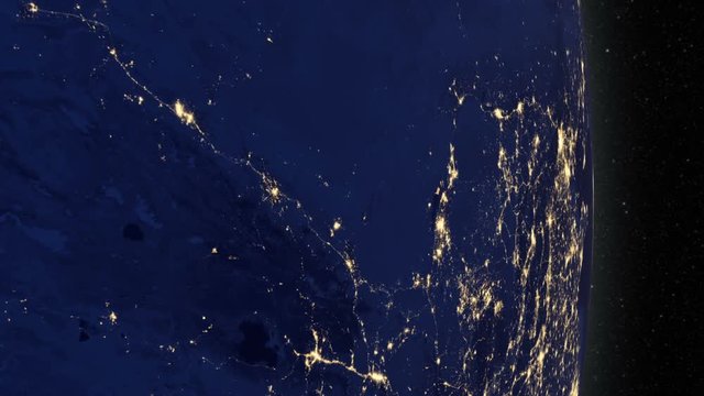 Night side of the Earth with city lights in Asia. Elements of this image furnished by NASA