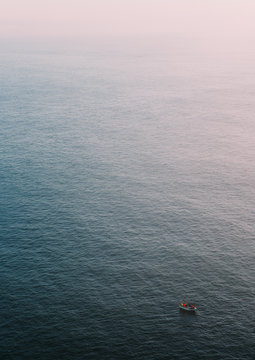 Aerial View Of Boat Sailing In The Ocean