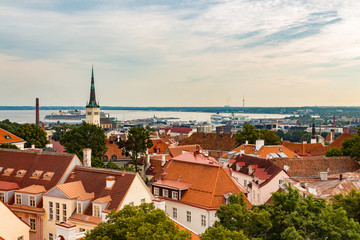Fototapeta premium Aerial view of Tallinn Old Town, seaport and cruise ships in a beautiful summer morning, Estonia