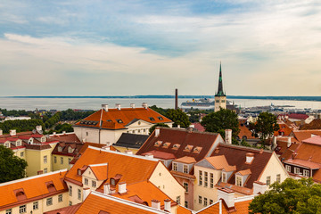 Fototapeta na wymiar Aerial view of Tallinn Old Town, seaport and cruise ships in a beautiful summer morning, Estonia