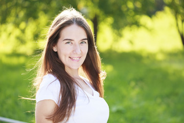 Portrait of beautiful young happy woman