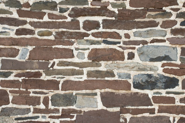 Stone masonry wall background texture