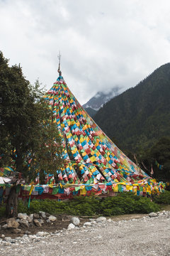 pagoda and prayer flags in the mountain
