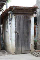 Old wooden toilet in village
