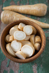 parsnip on wooden surface