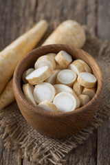 parsnip on wooden surface