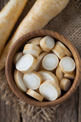 parsnip on wooden surface