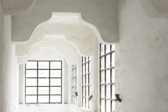 Old white room with windows