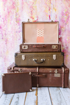 pyramid of several vintage suitcases