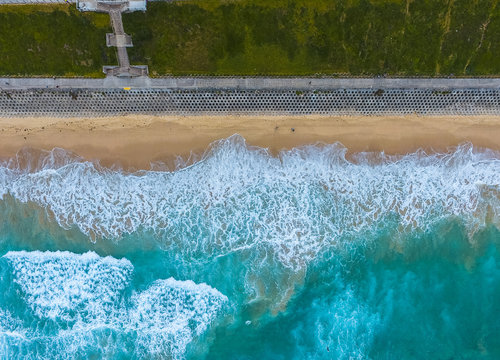 Looking down on a sandy surf beach in Sydney