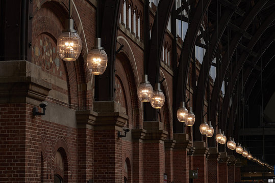 Street lamps on brick building