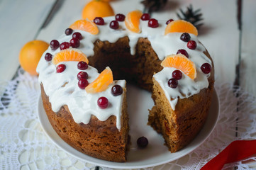  spiced fruit Christmas cake covered with cranberry and tangearing Kovrizhka Honey Cake