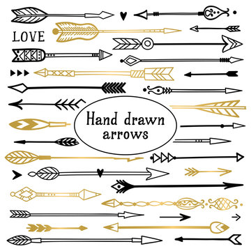 Hand drawn tribal arrows. Vector set.