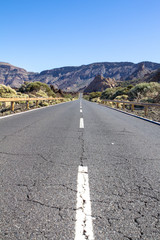 Lava rocks and road to the volcano Teide on Tenerife