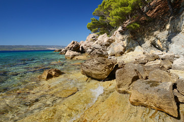 Fototapeta na wymiar Croatina coast near Makarska with Brac island on the background