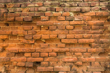 Red old brick wall, destroyed