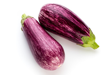 Fresh eggplants, aubergine on a white background.