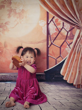 Asian baby girl celebrate mid-Autumn festival