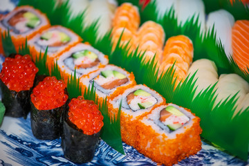 Traditional japanese food in the restaurant. Sushi large set