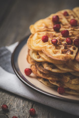 Dessert. Homemade sweet and hot pancakes on a rustic table