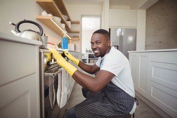 Portrait of smiling man in kitchen