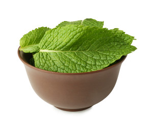 Bowl with fresh mint leaves on white background
