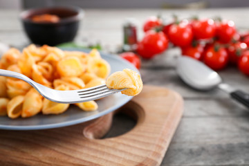 Delicious pasta with bolognese sauce on fork