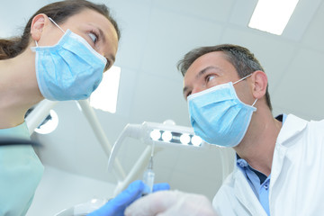 male dentist and his female assistant