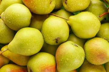 Delicious ripe pears as background
