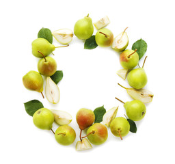 Frame made of delicious ripe pears on white background