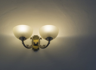 lightning retro chandelier on the white wall background