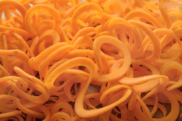 Raw carrot spaghetti, close up