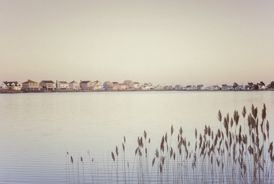 Calm Pond with Beach Homes
