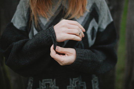 girl straightens clothes