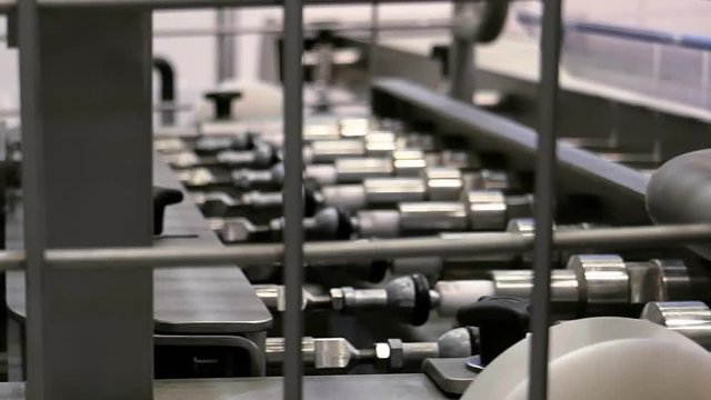 Food factory automated robotic production machine. Conveyor product line for cooking and packing rations and foods. Robotics and automatic lines used instead of human labor on factories and plants.
