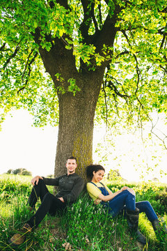 Farmer Couple Relaxing In The Nature At Afternoon.