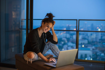 Woman working from her laptop