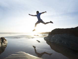 Runner on Beach at sunset.