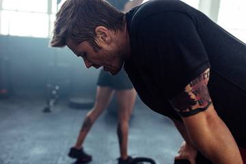 Man exhausted after workout
