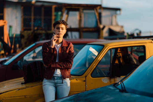 Young attractive woman smoking a cigarette