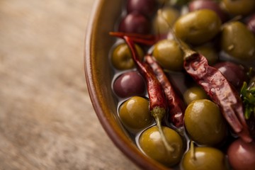 Close up of olives with red chili pepper