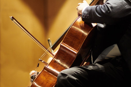 Closeup of cello player