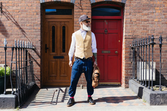 Eccentric Stylish Senior Man Portrait Out Of His House